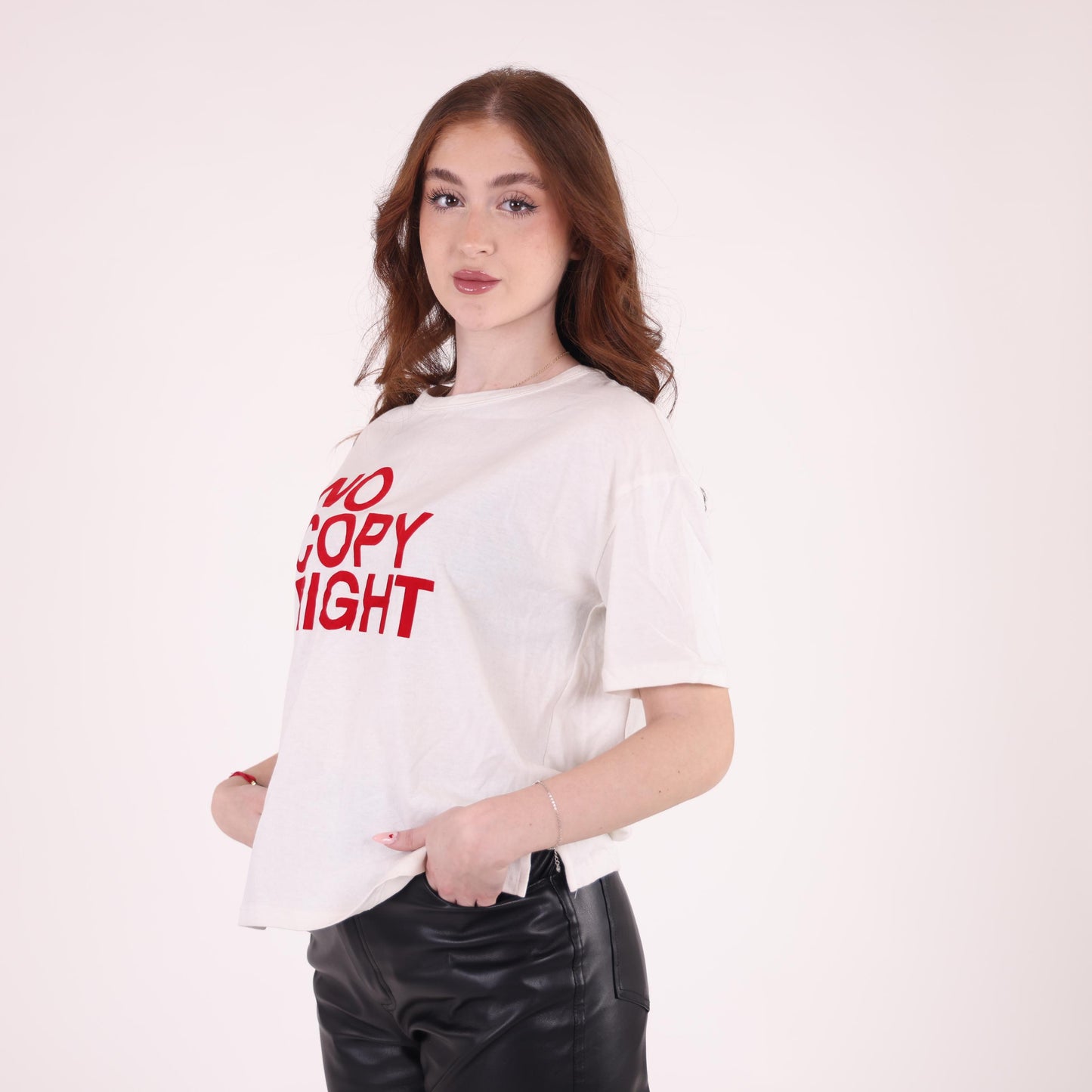White Graphic T-Shirt with "No Copyright" Print