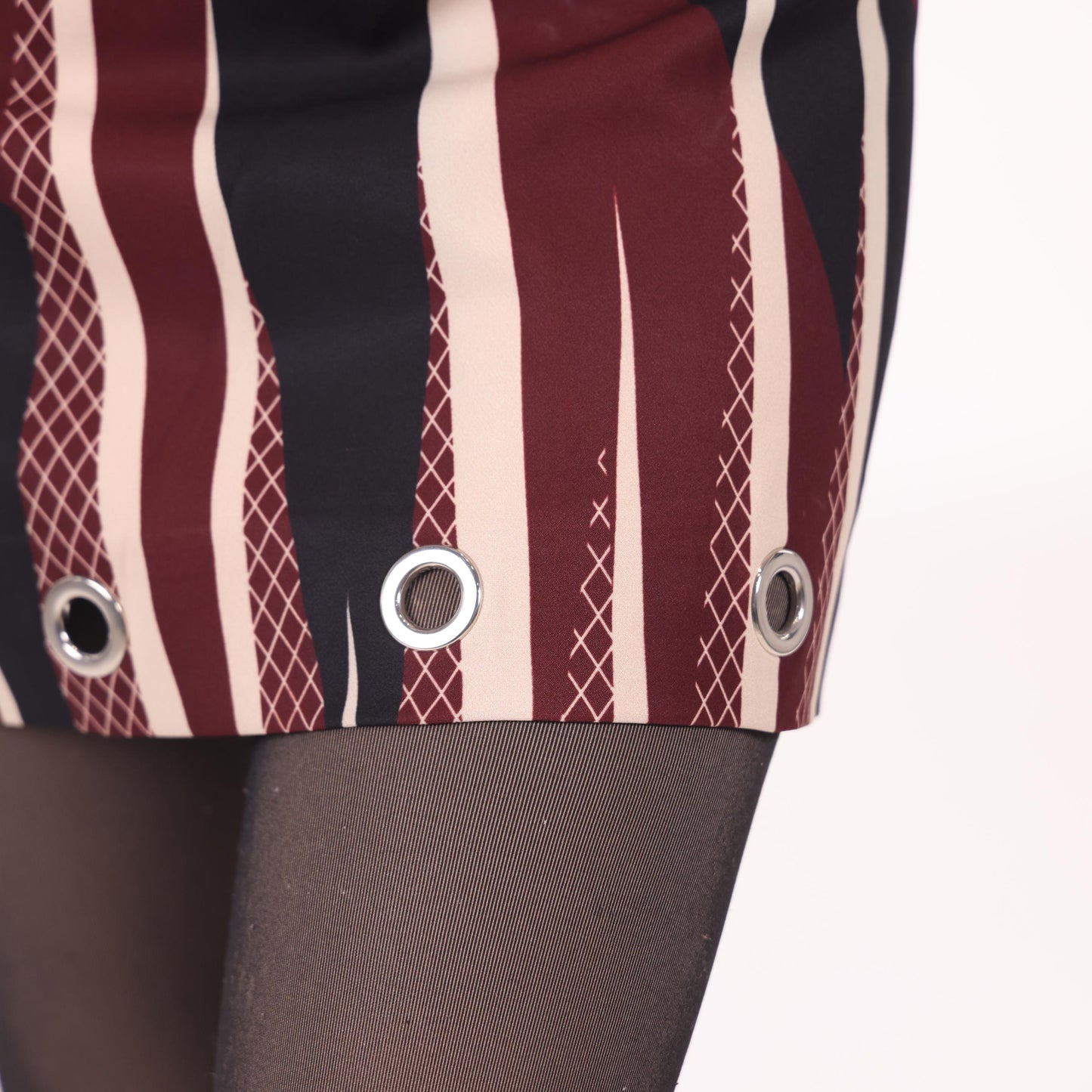 Striped Mini Skirt with Grommet Detailing