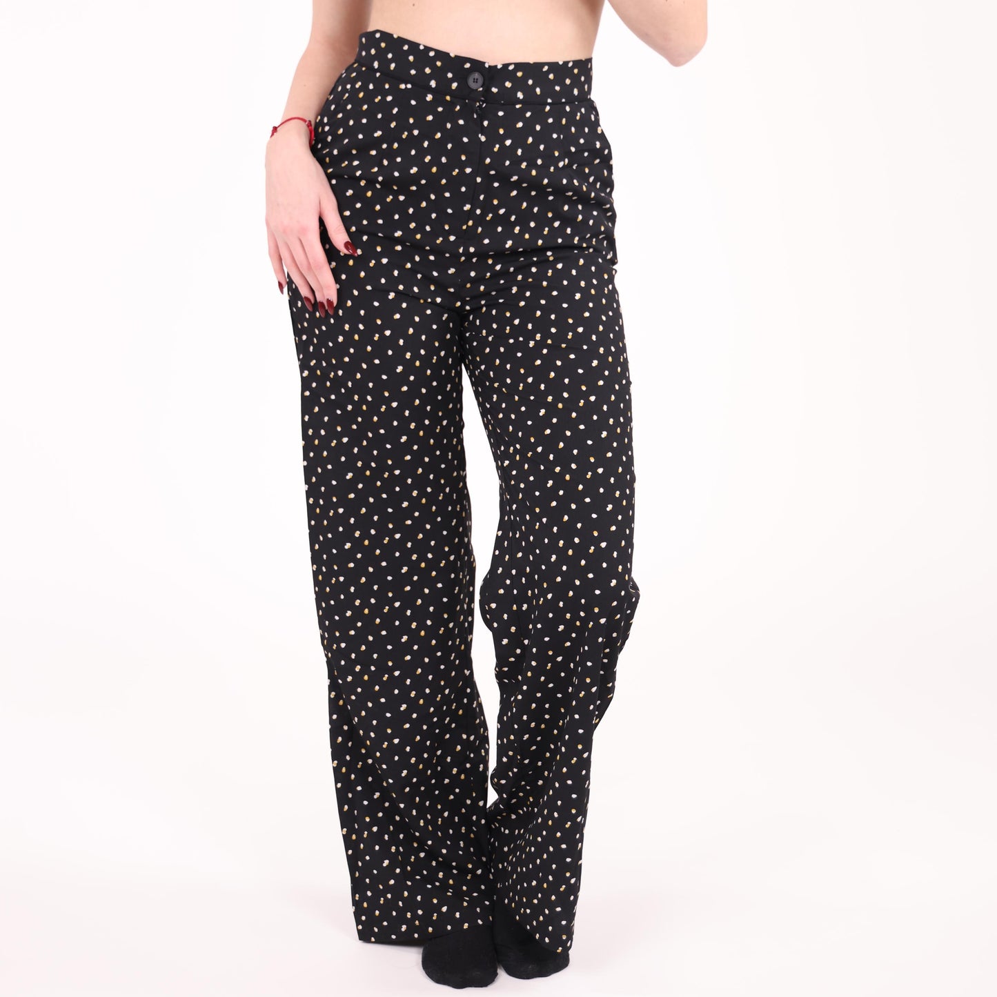 Black Wide-Leg Pants with White and Yellow Polka Dot Pattern