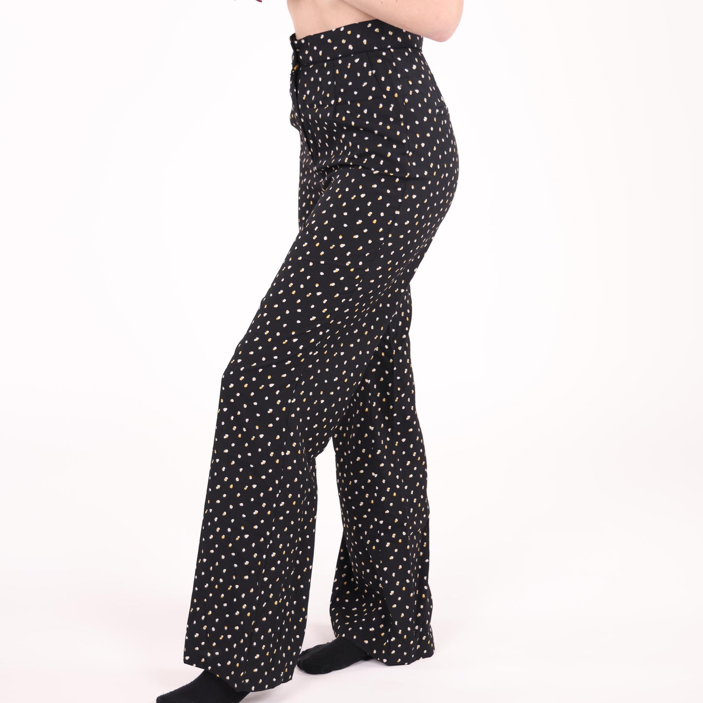 Black Wide-Leg Pants with White and Yellow Polka Dot Pattern