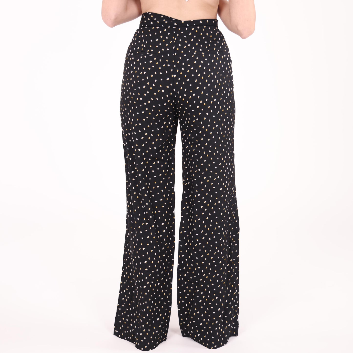 Black Wide-Leg Pants with White and Yellow Polka Dot Pattern